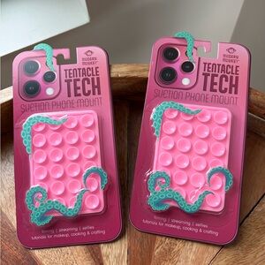 NWT PAIR OF SUCTION PHONE MOUNTS.Fits most phones. NEW